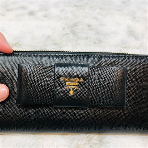 prada tat zipper|prada zippy wallet.